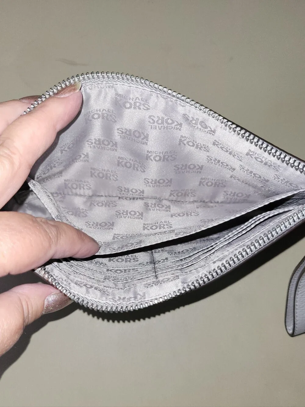 Michael Kors Grey Pebbled Leather Wristlet with Silver Logo